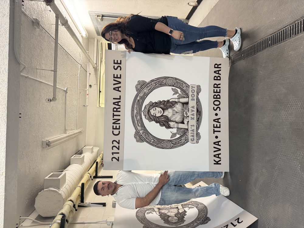 Co-founders with Gaia's Kava Root sign