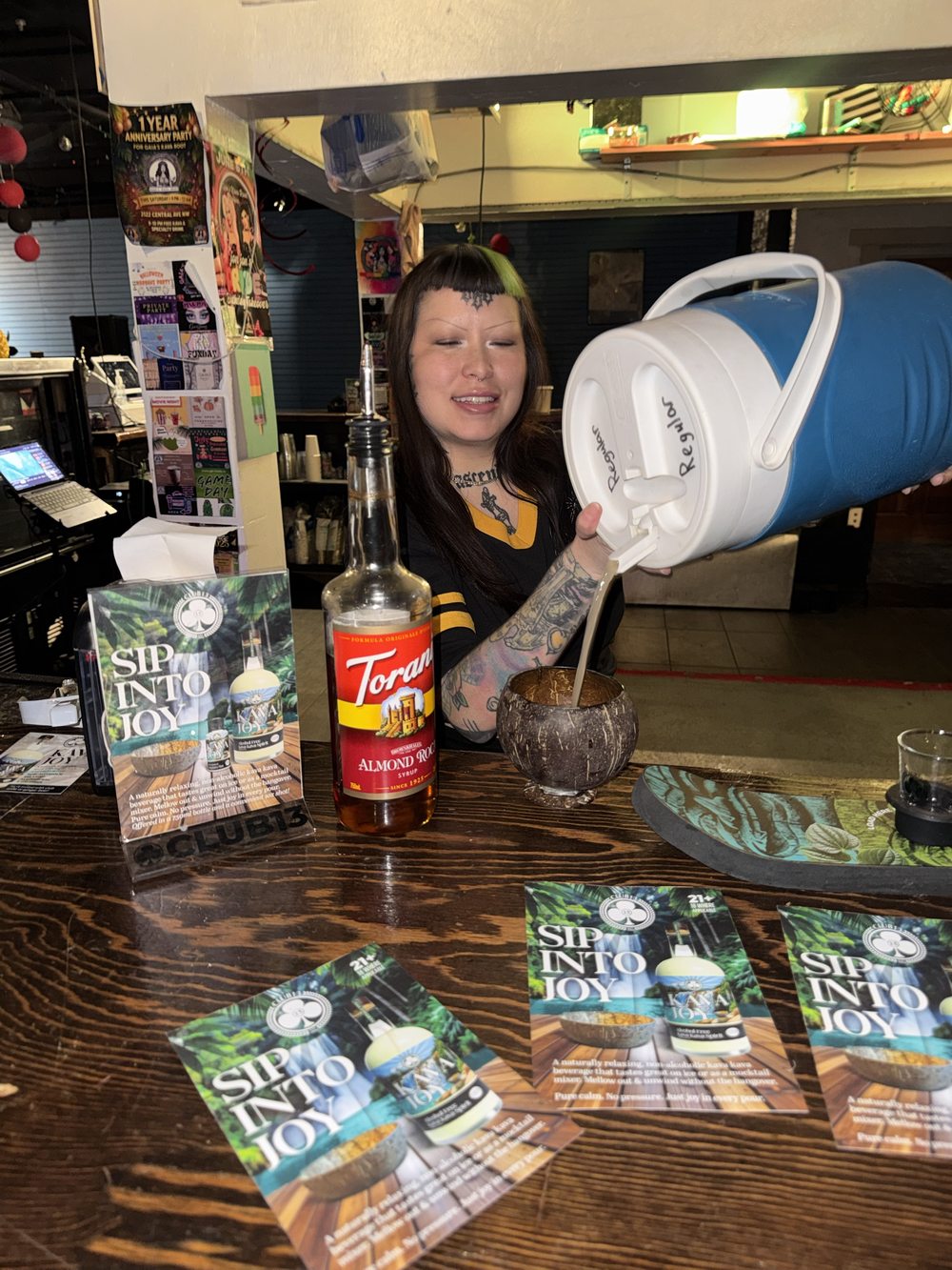 Bartender pouring kava at Gaia's